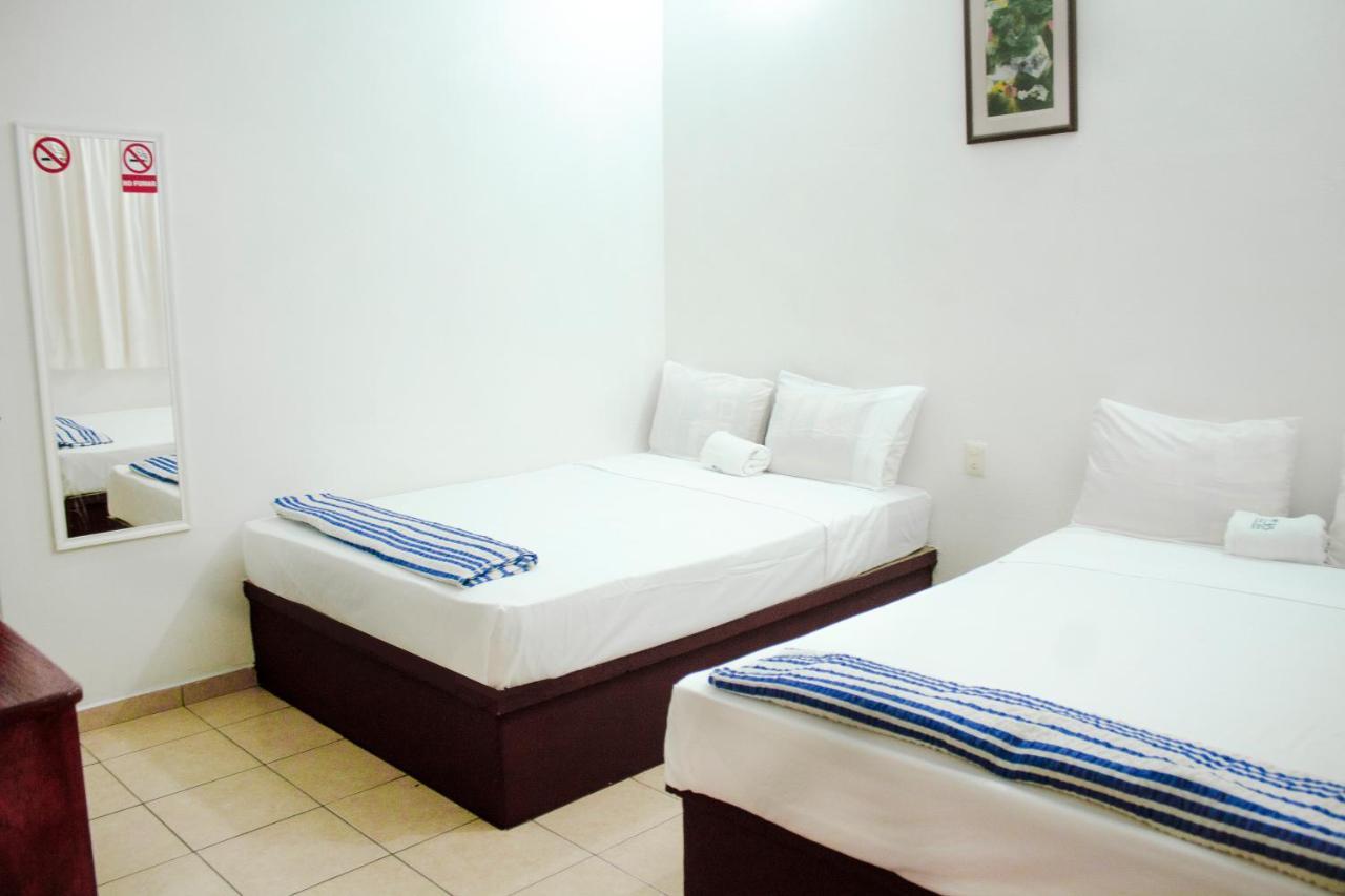 Hotel Om Downtown Santa Cruz Huatulco Bagian luar foto