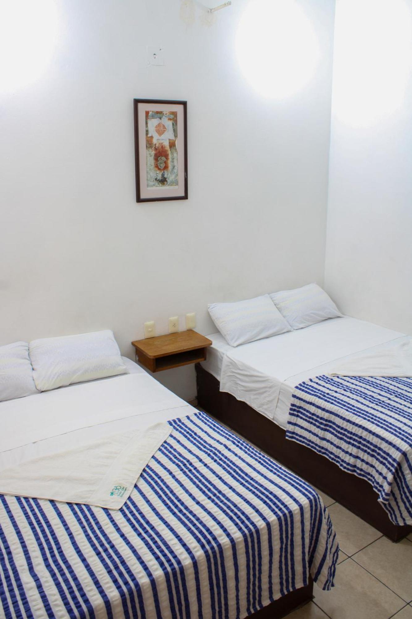 Hotel Om Downtown Santa Cruz Huatulco Bagian luar foto